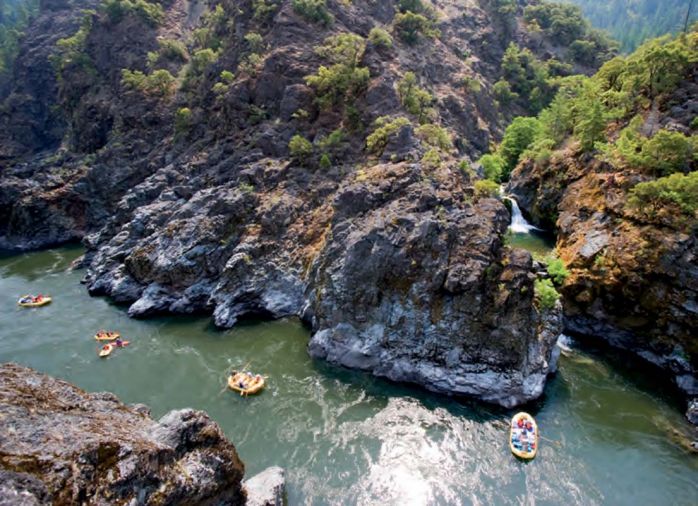 O.A.R.S. scenic raft trip through Stair Creek Falls. O.A.R.S also offers Wilderness Gourmet, Wine on the River, Craft Beer Tasting and lodge-based adventures on the Rogue River.