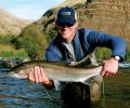 Jeremy Hull with a 10 lb Deschutes River wild summer steelhead.