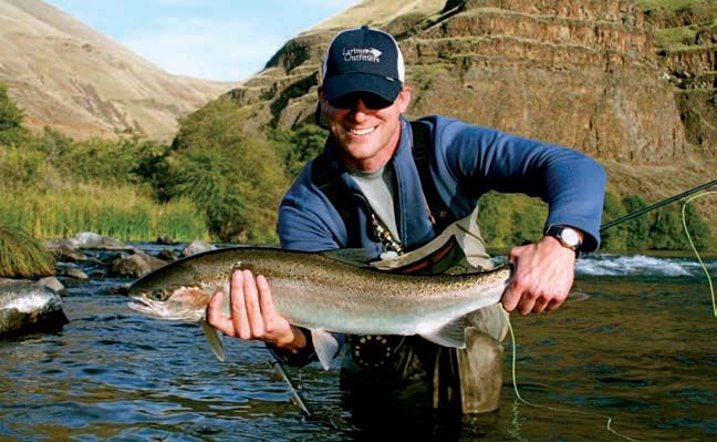 Jeremy Hull with a 10 lb Deschutes River wild summer steelhead.