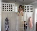 The loft features a ladder that invites children of all ages to lounge on a plush carpet remnant, pluck good reading from book shelves and bask in the light from an upper window.