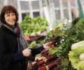 Diane Morgan, the author of Roots: The Definitive Compendium, shopping at the Portland Farmers Market.