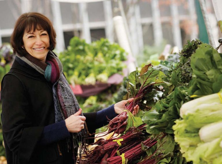 Diane Morgan, the author of Roots: The Definitive Compendium, shopping at the Portland Farmers Market.