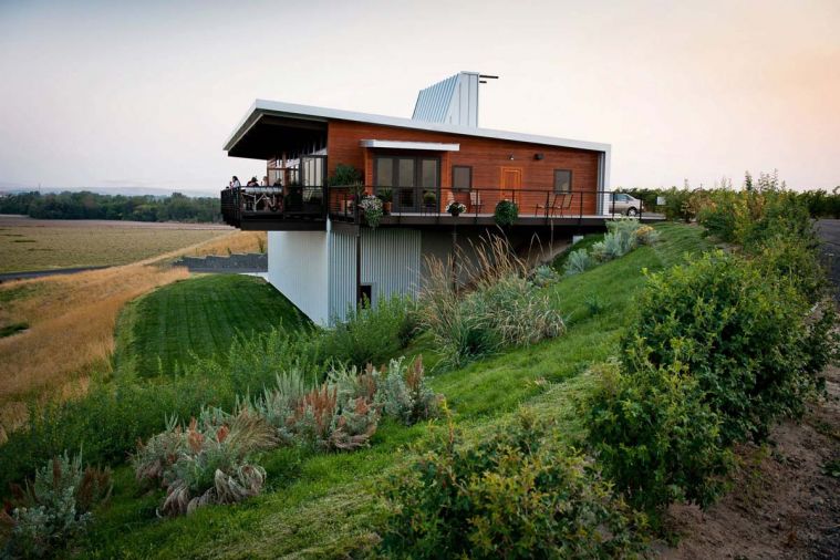 The uniquely designed tasting room at Amavi Cellars offers romantic views of the estate vineyards.