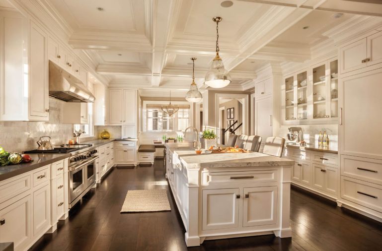 Vintage European style Jewel Pendant aluminum industrial lights with brass hardware by Hudson Goods provide task lighting for island. Backsplash tile by Pratt & Larson. Chown Hardware provided cabinet hardware.