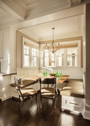 The slab walnut kitchen nook table was fabricated by The Joinery in Portland, Oregon and shipped to Connecticut.