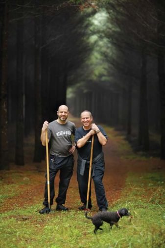 Chefs Christopher Czarnecki of the Joel Palmer House in Dayton (left) and Vitaly Paley of Paley’s Place and Imperial in Portland (right) brave the windswept winter rain to search for Oregon truffles in the fertile Willamette Valley.