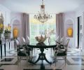 The elegant pedestal table and leggy Charles Frandin sideboard allow the geometrically patterned floor to be fully appreciated.