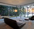 When the multi-panel sliding doors are stacked to either side of the living area, an unobstructed view opens to the San Juan and Canadian Gulf Islands to the West. Heated concrete floors can be activated from online when headed home from out of town. A pair of slim steel poles hold up the ten foot ceilings in the living area without compromising the view.