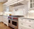 Keeping with the classic feel the homeowners wanted, gleaming white subway tile was selected for the backsplashes.