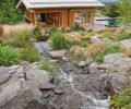 The rocks were imported, and individually placed in the tumbling water feature designed by Eamonn Hughes of Hughes’ Water Gardens. Originally from Ireland, Hughes has been designing Zen-inspired water features like this one in Oregon since 1987.