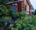 When is a garage not a garage? When it’s reimagined as 440 square feet of multi-purpose fun by Seattle’s Graypants studio. As well as enjoying lush natural surroundings and spectacular Puget Sound views, the petite outbuilding sports a volume-enhancing pitched roof and a comely exterior mix of wood, glass and copper.