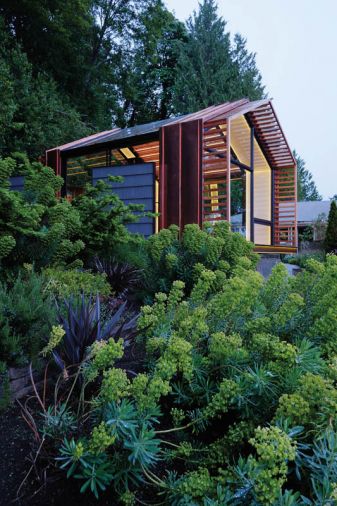 When is a garage not a garage? When it’s reimagined as 440 square feet of multi-purpose fun by Seattle’s Graypants studio. As well as enjoying lush natural surroundings and spectacular Puget Sound views, the petite outbuilding sports a volume-enhancing pitched roof and a comely exterior mix of wood, glass and copper.