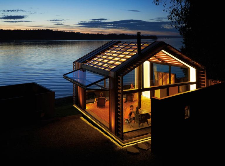 The multi-purpose building boasts an aptly diverse material mix. At dusk, with its LED elements aglow, the glass-encased box assumes the magical cast of fireflies in a bottle.