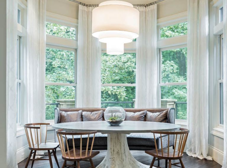 A composite of all the elements in the redesign, the breakfast area weds dark wood, the trees, a light and airy feel and a practical eating area for the Lake Oswego family. Facing the kitchen, the eating area is also close to the living and dining rooms and shares many of the same shapes and tones to provide fluid cohesion throughout the home’s public areas.