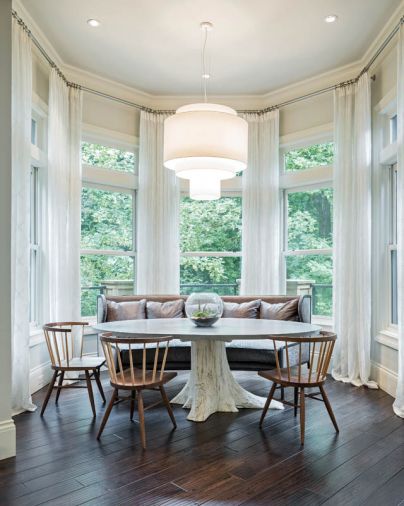 A composite of all the elements in the redesign, the breakfast area weds dark wood, the trees, a light and airy feel and a practical eating area for the Lake Oswego family. Facing the kitchen, the eating area is also close to the living and dining rooms and shares many of the same shapes and tones to provide fluid cohesion throughout the home’s public areas.