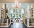 The living room underwent a similar transformation and repeated many of the same elements. In both rooms it was important to the homeowners to allow in as much natural light as possible and to use the view of the outside forest as a focal point.