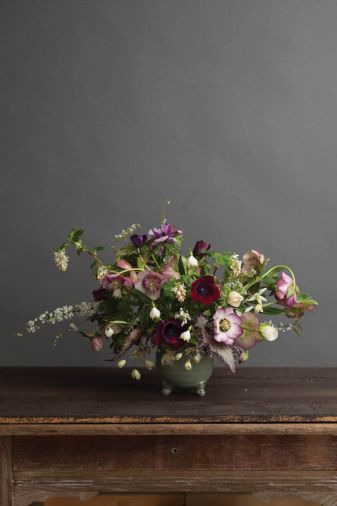 SPRING SNOWFLAKE BLOOMS + BOLD BEGONIA LEAVES – THE STEMS YOU’LL NEED: 4 Helleborus x orientalis, 7 Anemone ‘Pastel Mix’ and ‘Bordeaux,’ 3 Begonia foliage, 2 Clematis armandii, 5 Leucojum vernum, 3 Ribes sanguineum, ‘White Icicle’ 3 Sarcococca humilis, 5 Spirea thunbergii.