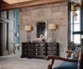 A Flemish antique bench from Obsolete in Santa Monica; entry credenza from Therien & Co. in Los Angeles.