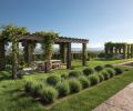 David Smith & Co. supplied the millstone table and chairs beneath the arbor.