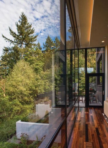 Glass railings ring the terrace off master.