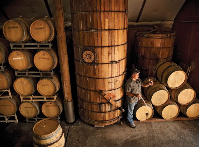 Valley View Winery Winemaker John Guerrero samples a barrel.  Valley View was originally established in the 1850s by Oregon pioneer Peter Britt in the Applegate Valley near the historic town of Jacksonville.  The Wisnovsky family restored the winery in the early 1970s and continues to operate it today.