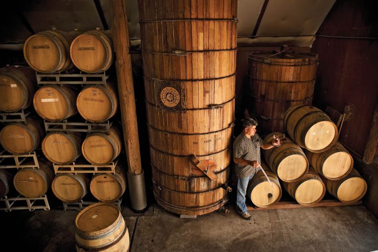 Valley View Winery Winemaker John Guerrero samples a barrel.  Valley View was originally established in the 1850s by Oregon pioneer Peter Britt in the Applegate Valley near the historic town of Jacksonville.  The Wisnovsky family restored the winery in the early 1970s and continues to operate it today.