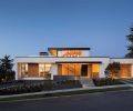 Viewed from the street, architect Tim Eddy’s Southeast Portland home almost appears to float above the ground. Fusing contemporary style with cutting edge sustainability features and alluding to a few traditional touches, Tim designed his home to create the kind of life he and his wife, Joyce Bell, wanted to live. From the entryway to the rooftop terrace and viewbox reading room, the Eddys  home is filled with delightful spaces for real life: working, cooking, reading, entertaining, relaxing and enjoying the outdoors.