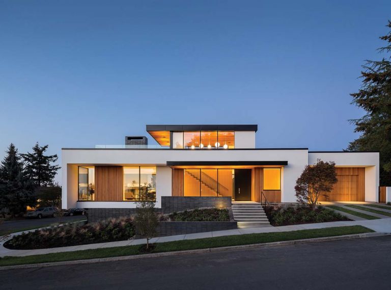 Viewed from the street, architect Tim Eddy’s Southeast Portland home almost appears to float above the ground. Fusing contemporary style with cutting edge sustainability features and alluding to a few traditional touches, Tim designed his home to create the kind of life he and his wife, Joyce Bell, wanted to live. From the entryway to the rooftop terrace and viewbox reading room, the Eddys  home is filled with delightful spaces for real life: working, cooking, reading, entertaining, relaxing and enjoying the outdoors.