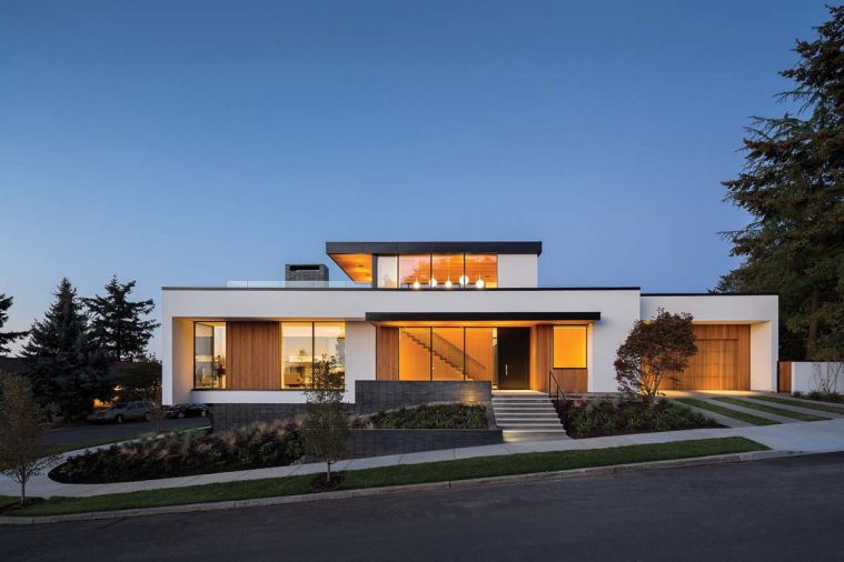 Viewed from the street, architect Tim Eddy’s Southeast Portland home almost appears to float above the ground. Fusing contemporary style with cutting edge sustainability features and alluding to a few traditional touches, Tim designed his home to create the kind of life he and his wife, Joyce Bell, wanted to live. From the entryway to the rooftop terrace and viewbox reading room, the Eddys' home is filled with delightful spaces for real life: working, cooking, reading, entertaining, relaxing and enjoying the outdoors.