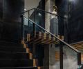 Andrew Patterson recalls unearthing old growth floor timbers in the stables, which they used as treads with a carpet runner of steel on the cantilevered staircase.