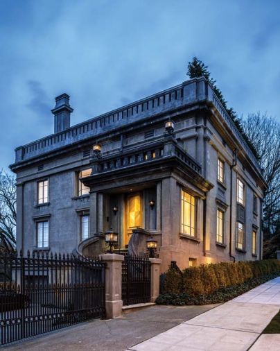 Garret Cord Werner refurbished the once electrified exterior lamps to glow again with gas.