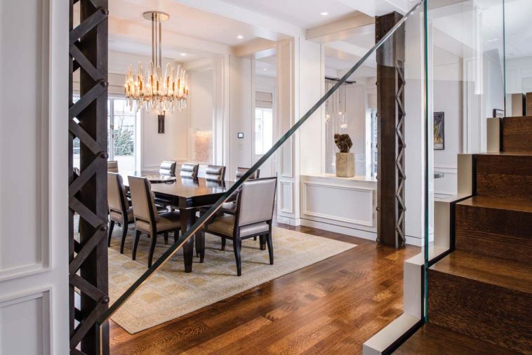 GCW hired Stephen Hirt to execute his design of the unique chandelier. His table and chairs with Holly Hunt leather juxtapose exposed steel girders.