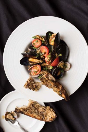 Try a taste of the Islands at home with Steamed Clams and Mussels with Garlic, Onions, Scallions, Baby Tomatoes, and Sherry from Executive Chef Raymond Southern of The Mansion Restaurant at Rosario Resort and Spa.