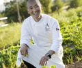 JORY Restaurant Executive Chef Sunny Jin harvesting fresh herbs from the one-acre chef’s garden.