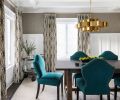 Blues and yellow in the family gathering room and brass and turquoise in the formal dining room give the rooms a lively infusion of color.