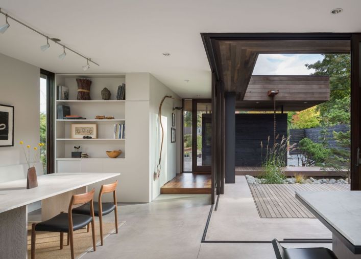 They created a garden shed that served double-duty: providing ample space for garden implement storage, while screening the raised beds on the south side of the home from interior view. 
© Andrew Pogue